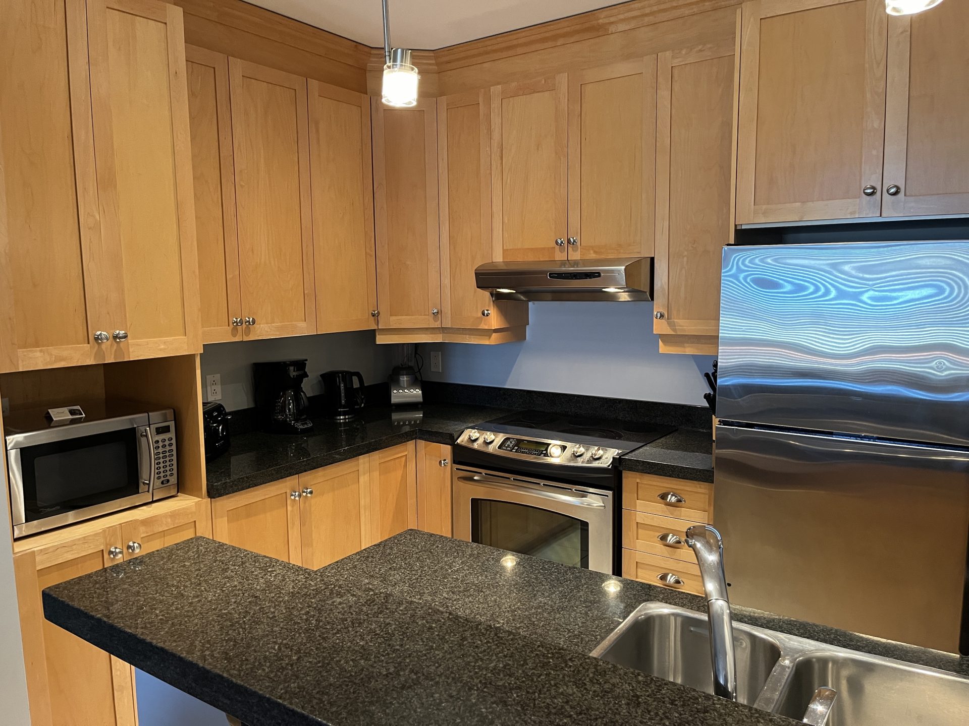 Modern kitchen with stainless steel